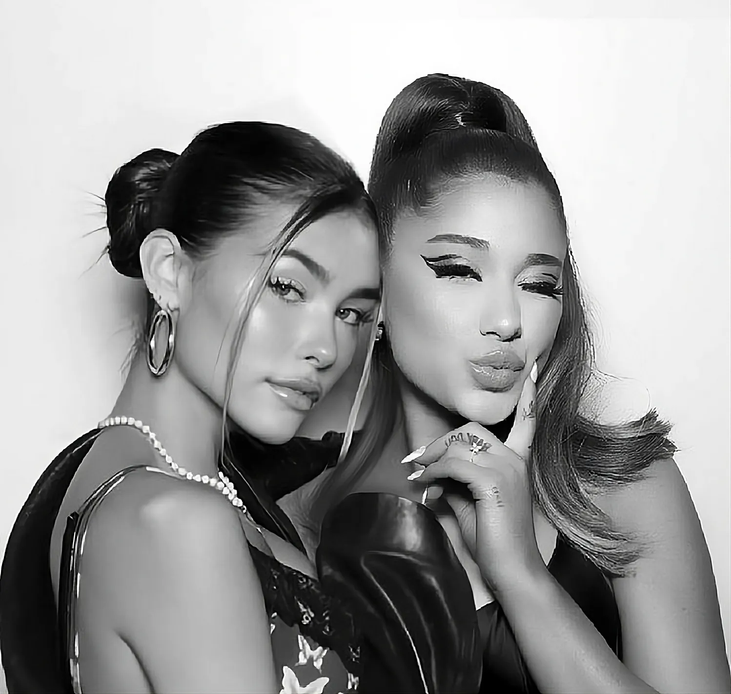 Ariana Grande and Madison Beer quiz you